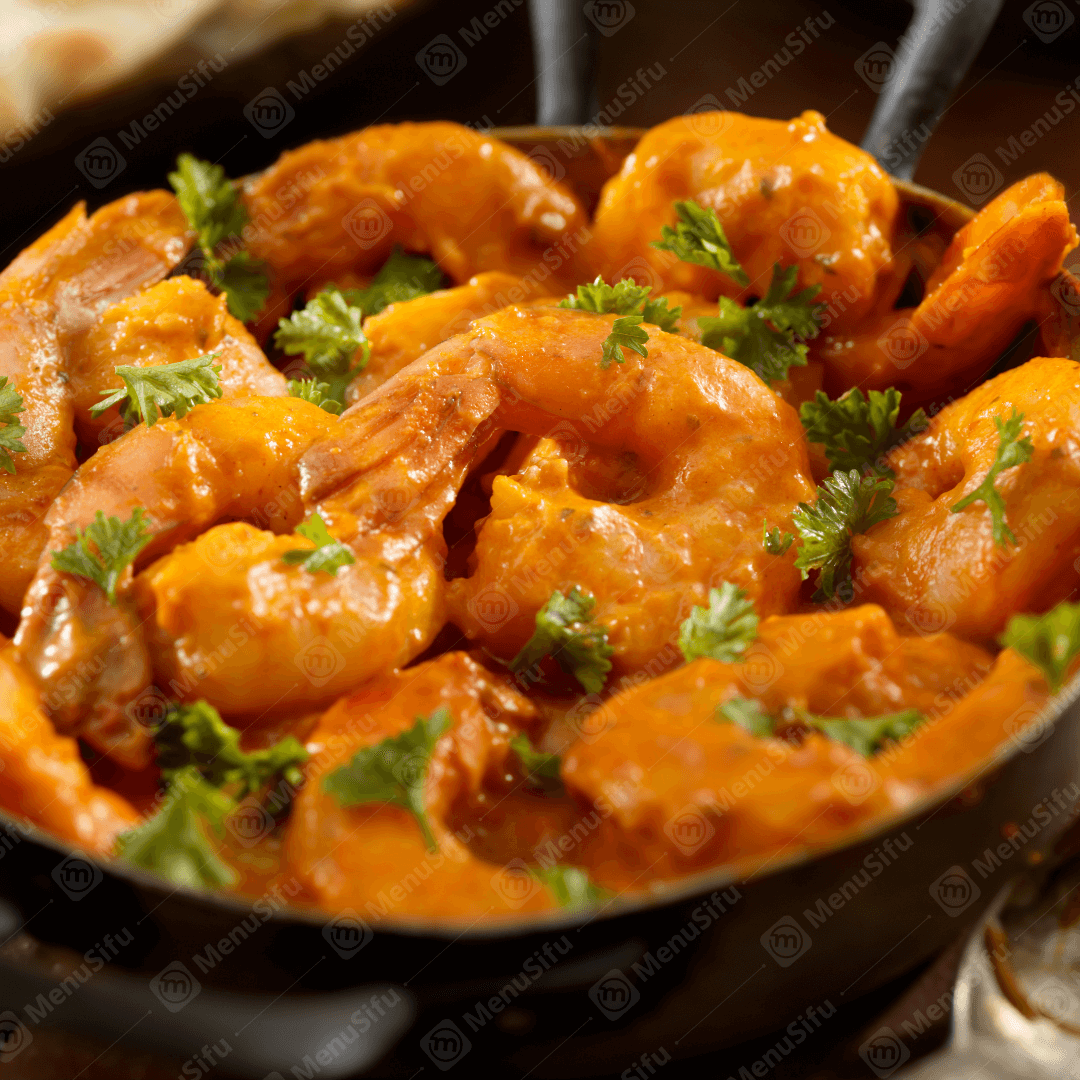 Shrimp in rich curry sauce garnished with cilantro at Pho Real - Southeast Asian Restaurant in New York
