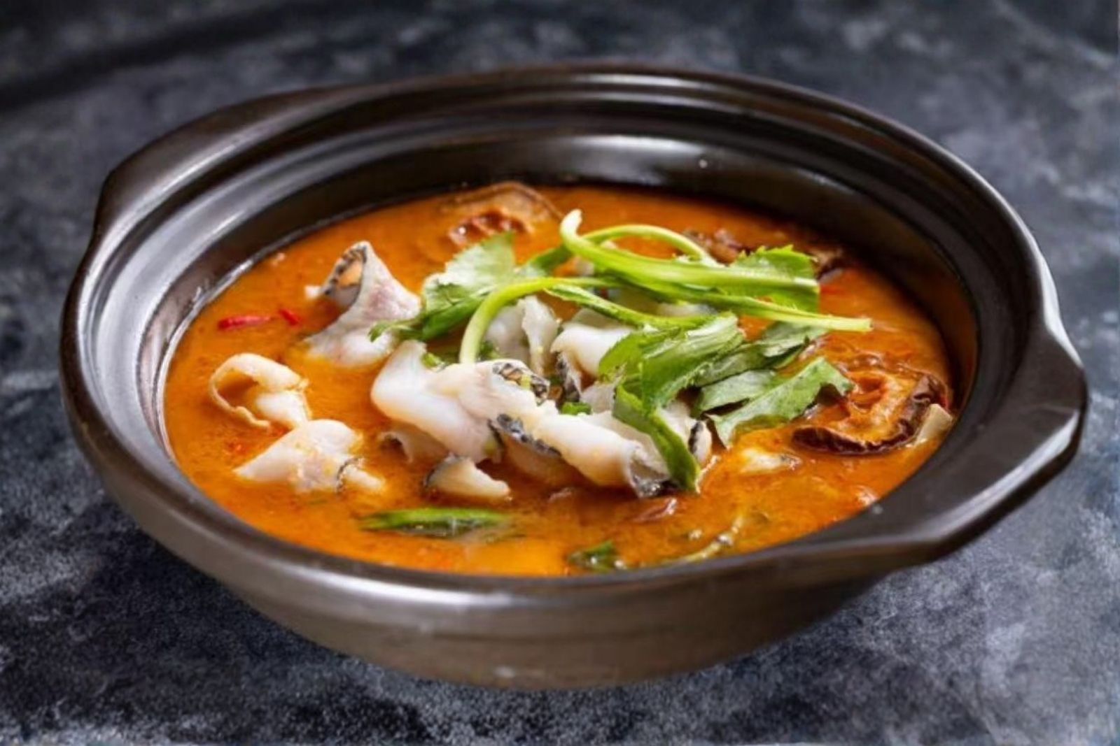 Yunnan spicy & sour papaya soup with snakehead fish fillet at Ping's Bistro Rowland, a Chinese Restaurant in Hacienda Heights