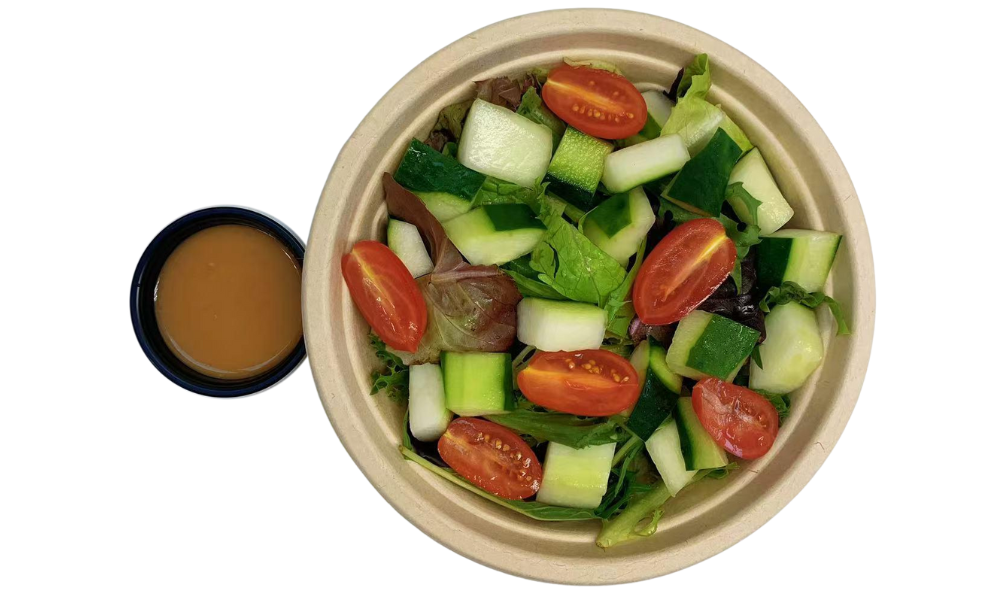Fresh mix of greens, cucumbers, and tomatoes at Poke 46, a Japanese Restaurant in Pine Brook