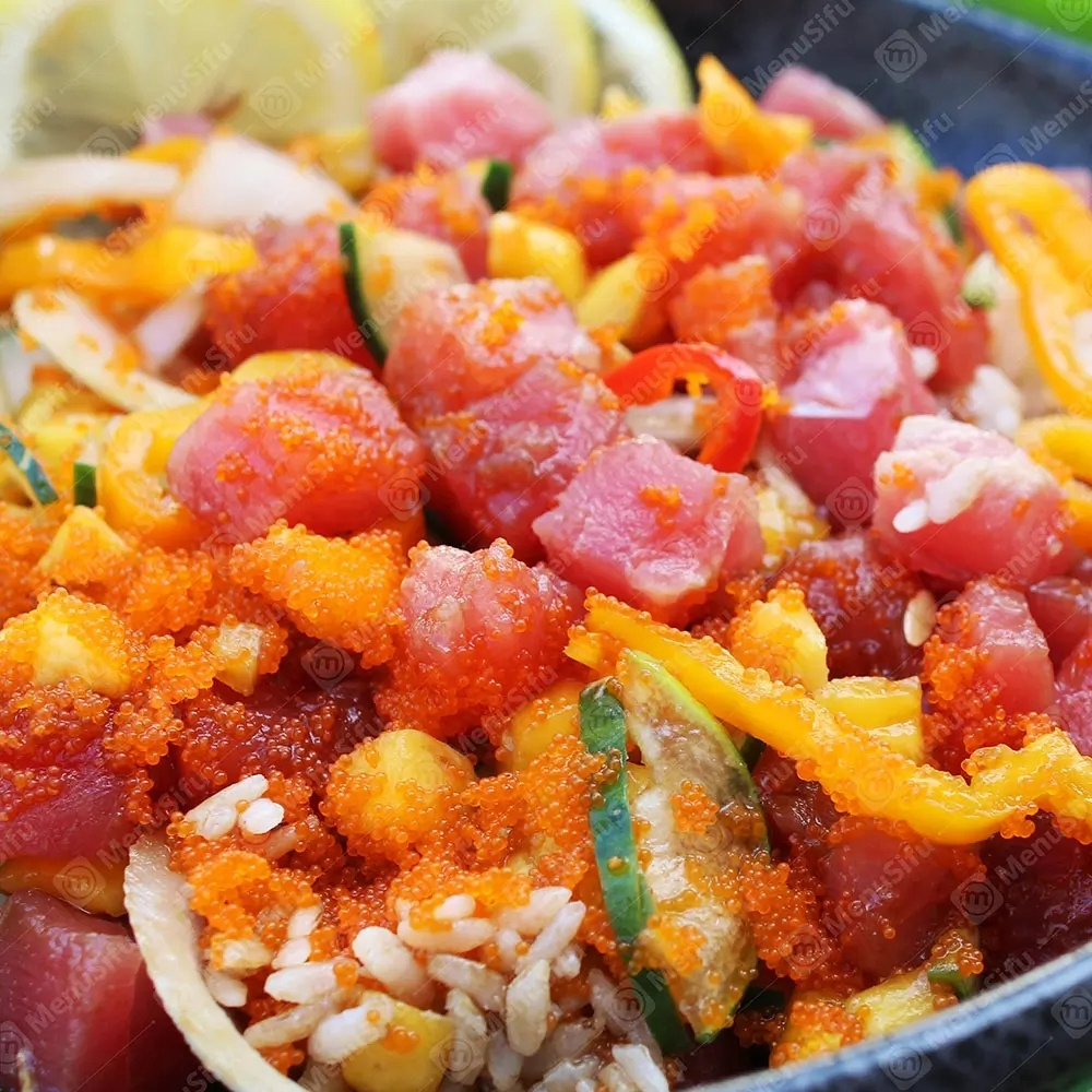 Ahi tuna poke bowl with tobiko, mango, and veggies at Poke Bowl, an Hawaiian Restaurant in Algonquin