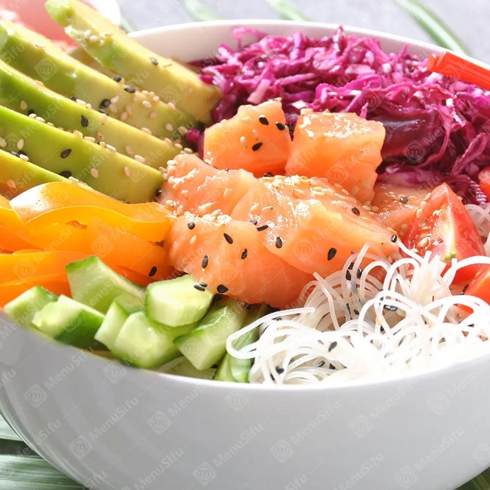 Salmon poke bowl with avocado, cucumber, and rice noodles at Poke Bowl, an Hawaiian Restaurant in Algonquin