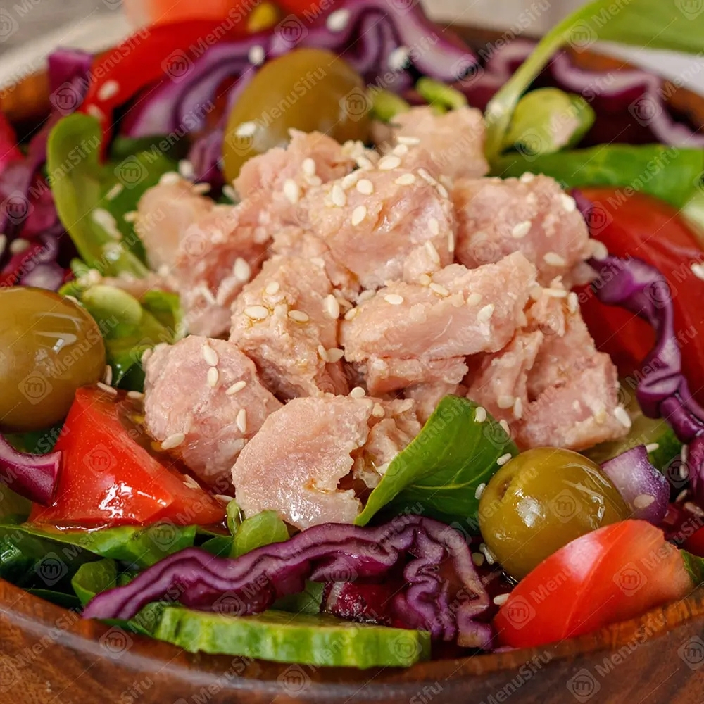 Tuna salad bowl with olives, tomatoes, and mixed greens at Poke Bowl, an Hawaiian Restaurant in Algonquin