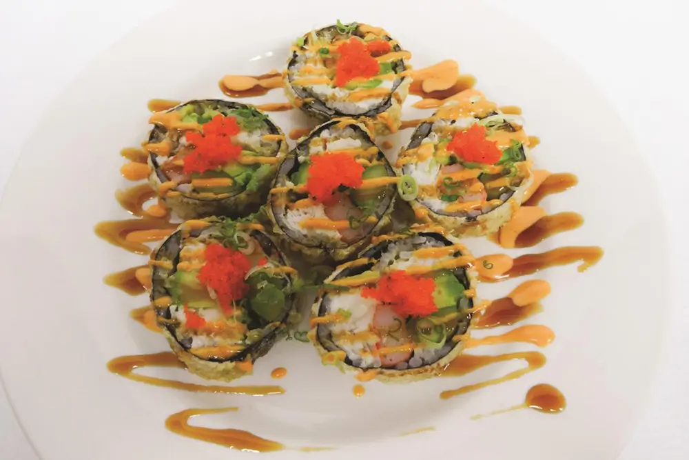 Crispy sushi rolls with savory sauces at Poke Fresh, a Poke bar in Houston