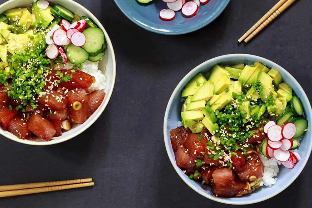 Two bowls of fresh tuna poke bowl at Poke Fresh, a Poke bar in Houston