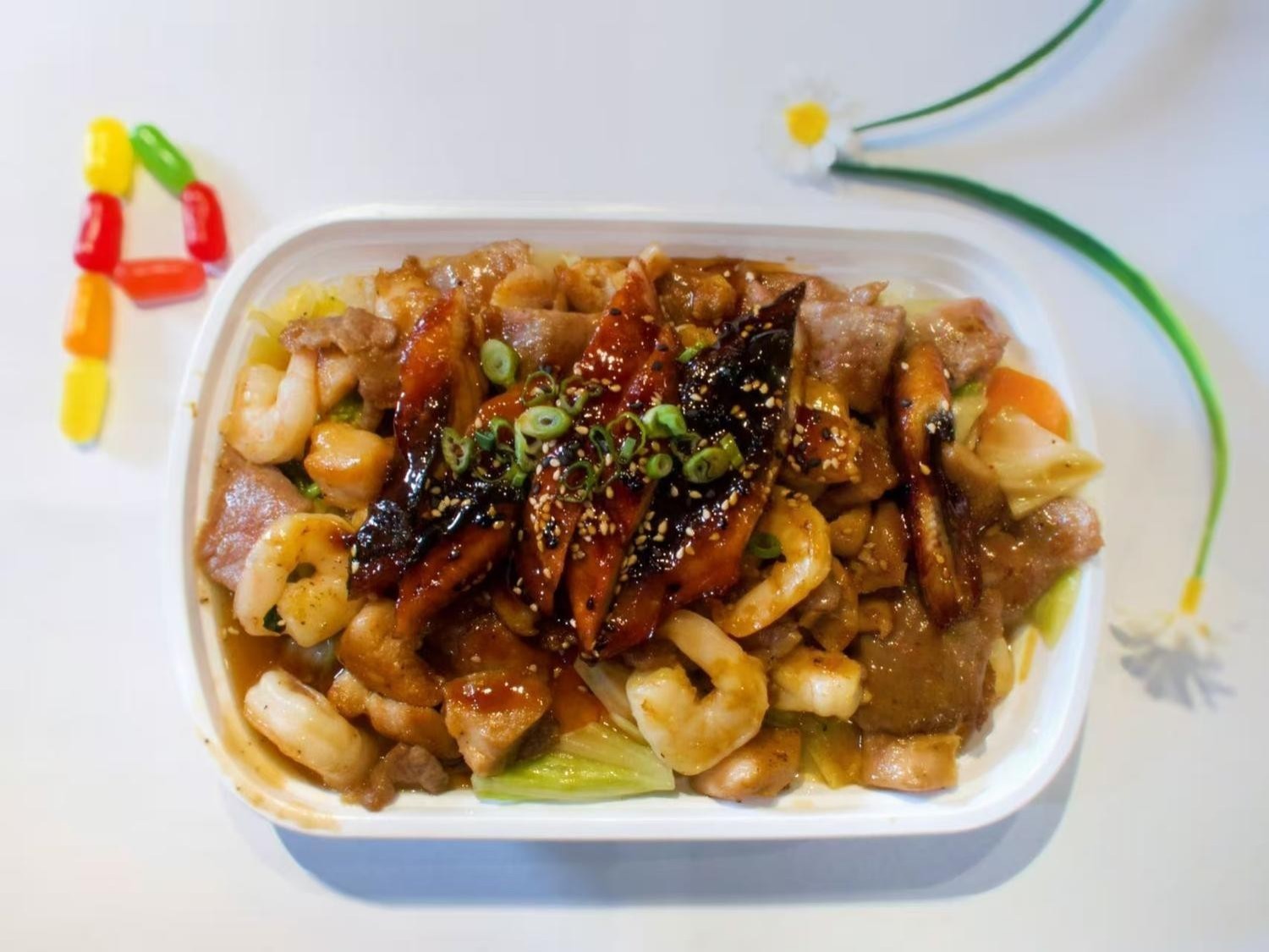 Hibachi bowl with chicken, shrimp, pork, veggies in savory sauce at Poke Hibachi, a Japanese Restaurant in West Lafayette