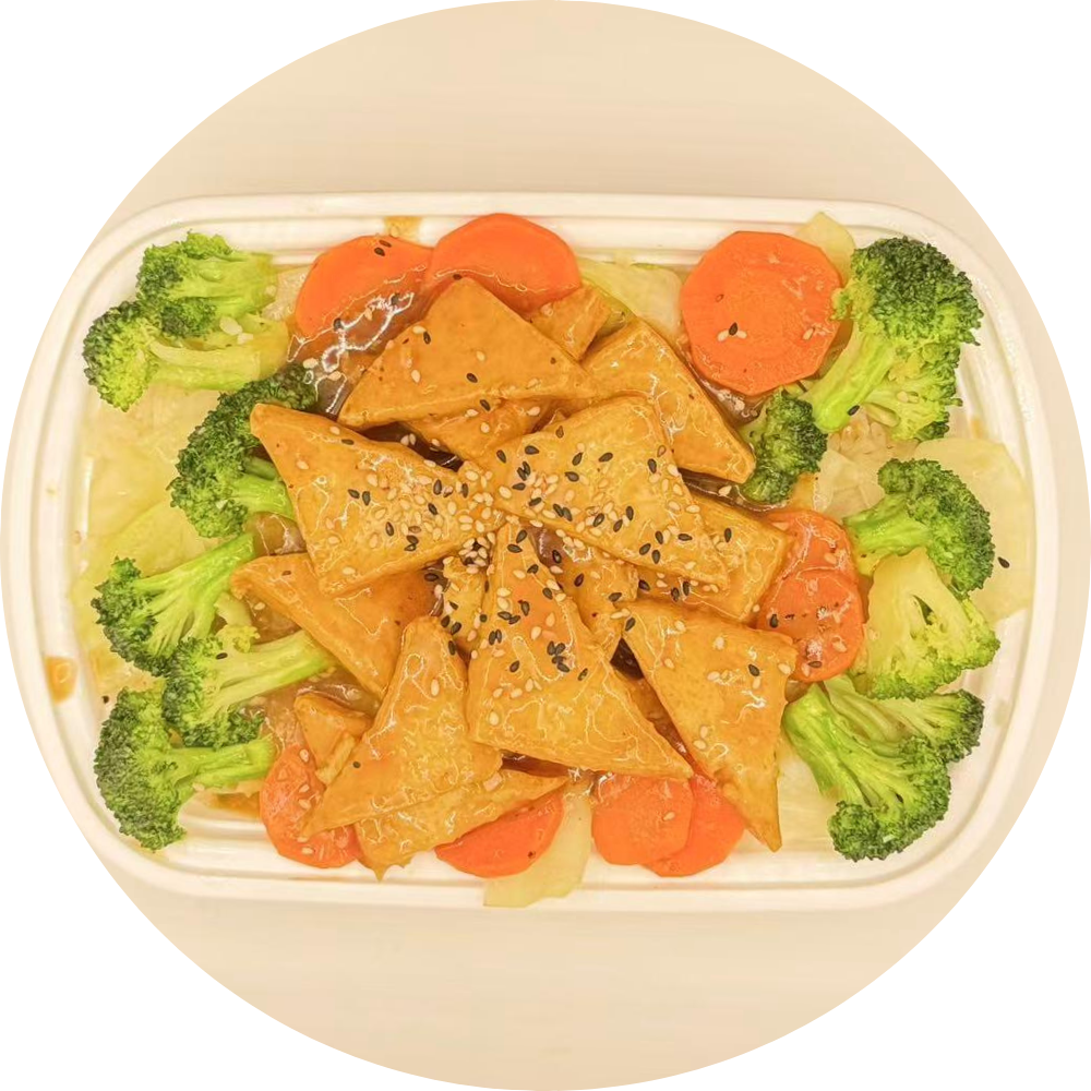 Bowl with triangular tofu, veggies, sesame seeds at Poke Hibachi, a Japanese Restaurant in West Lafayette