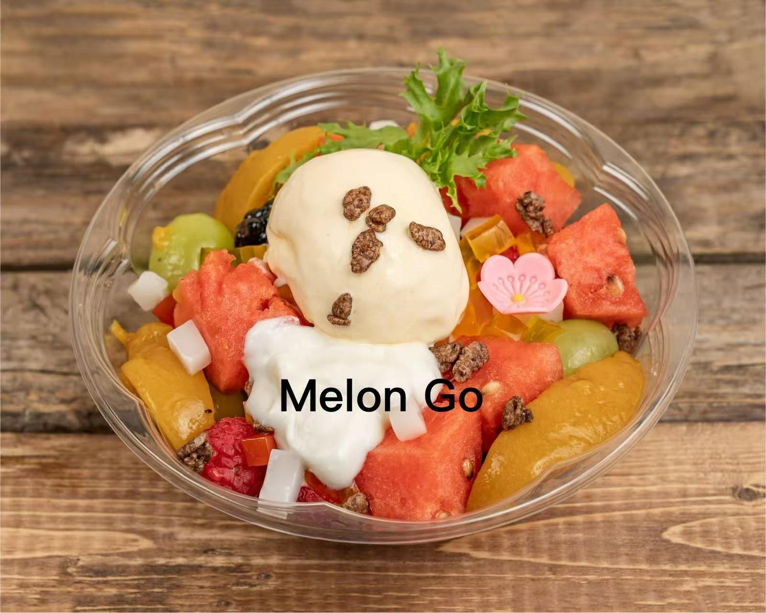 Melon Go fruit bowl with ice cream, mixed fruits, and granola at Poke House Huntington, a Hawaiian restaurant in Huntington Melon Go fruit bowl with ice cream, mixed fruits, and granola at Poke House Huntington, a Hawaiian restaurant in Huntington