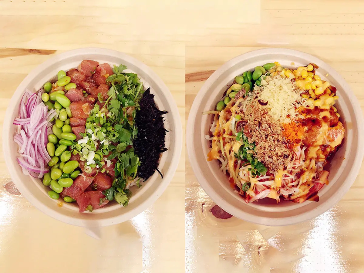 Pokéloha-Asian-Fusion-Restaurant-Two-Poke-Bowls-KS Two poke bowls with tuna, edamame, and various toppings at Pokéloha, a Asian Fusion Restaurant in Woonsocket
