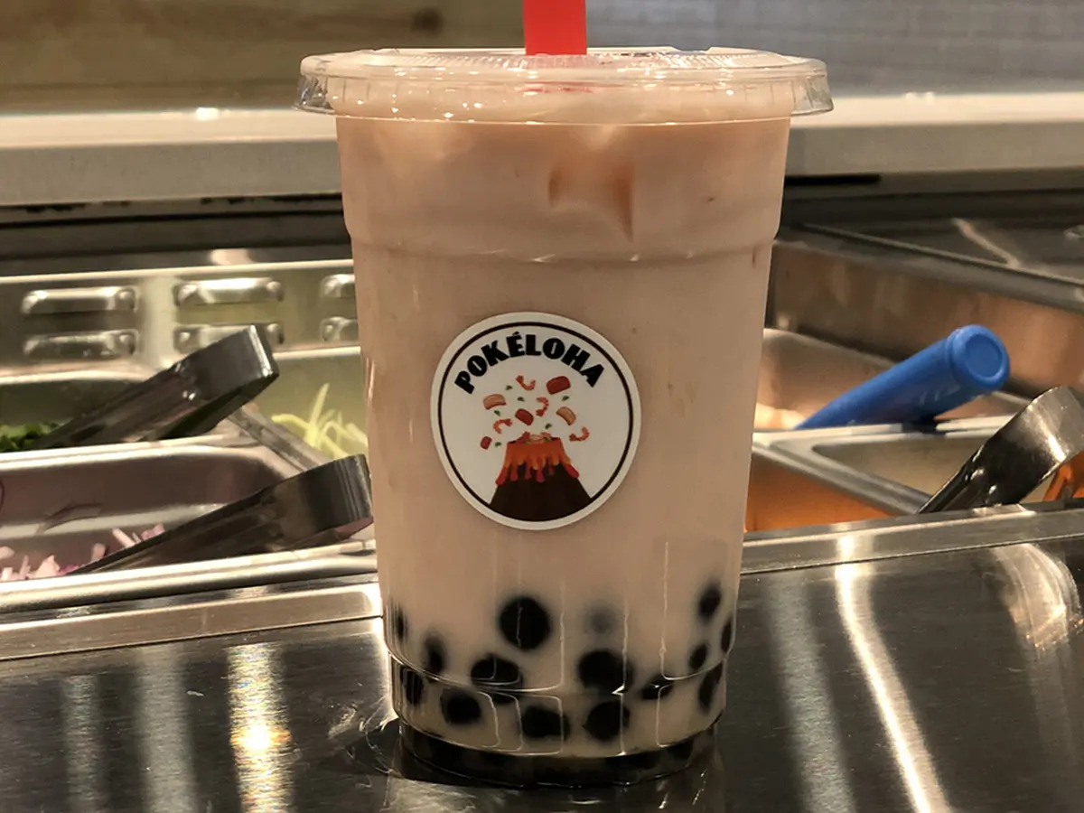 Pokéloha-Asian-Fusion-Restaurant-Bubble-Tea-KS Bubble tea with chewy tapioca pearls in a plastic cup at Pokéloha, a Asian Fusion Restaurant in Woonsocket