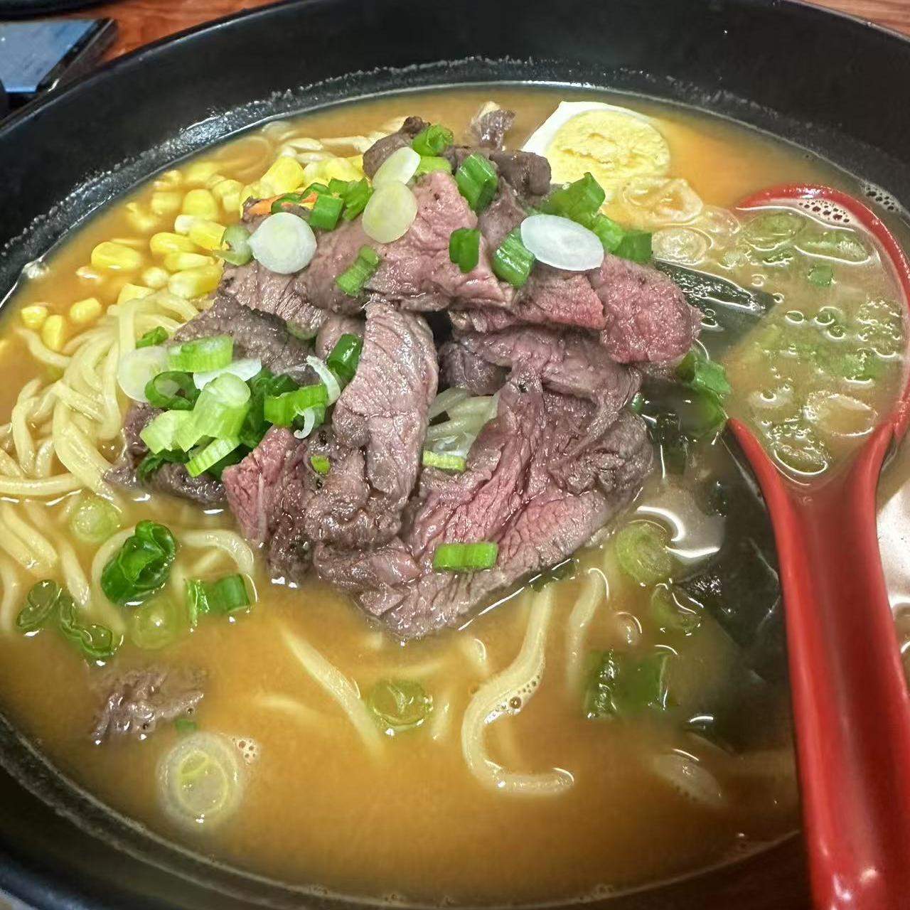 Poke-Star-Hawaiian-Poke-Bowl-Restaurant-Beef-Ramen-Bowl-Clemson Beef Ramen Bowl - Beef ramen with corn, egg, scallions in rich broth at Poke Star, a Hawaiian Poke Bowl Restaurant in Clemson