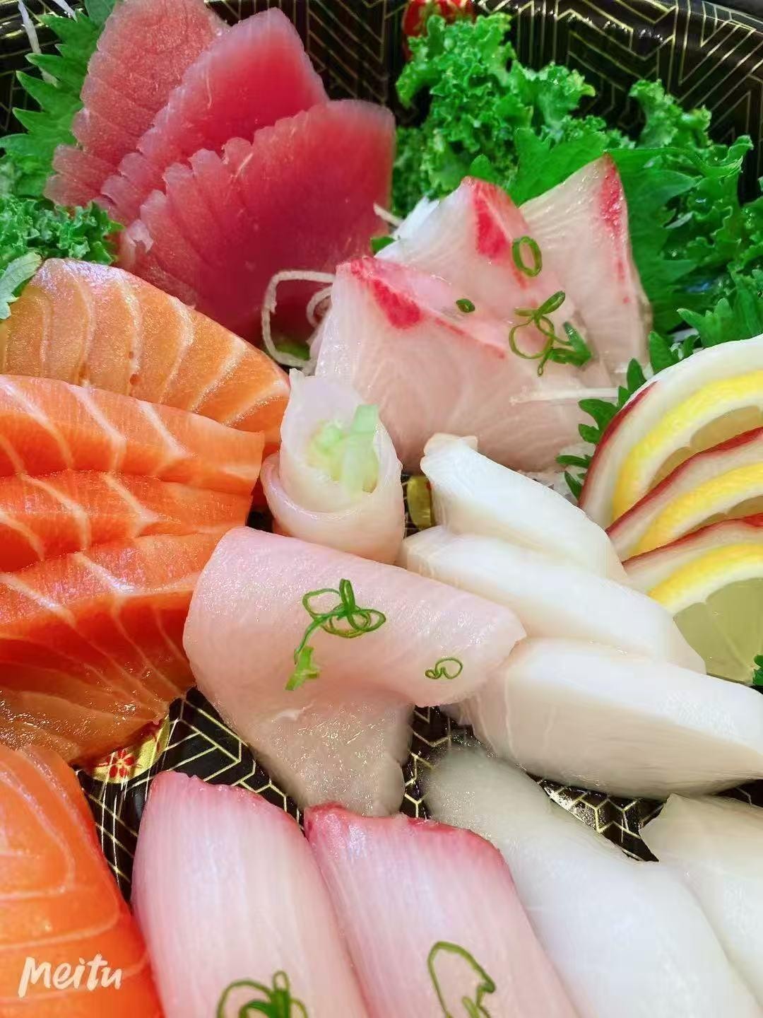 A vibrant platter of assorted fresh sashimi at Poke Zone, a Japanese Restaurant in Edgewater