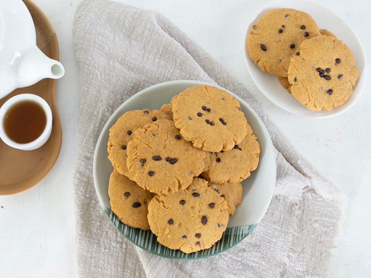 Chocolate chip cookies served with tea in a bowl and plate at Pop Onigiri, a Dessert Shop in Bonita Springs