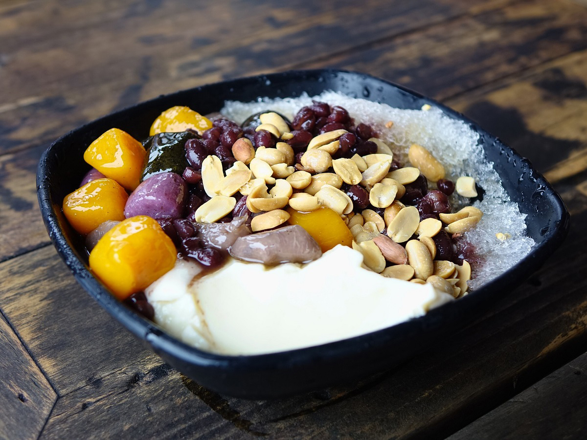Shaved ice dessert with taro balls, red beans, peanuts, and tofu pudding at Pop Onigiri, a Dessert Shop in Bonita Springs