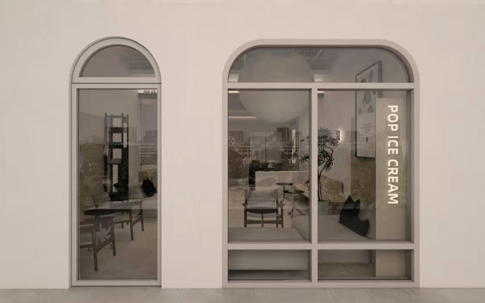 Arched glass storefront with vertical POP ICE CREAM lettering and warm minimalist interior view at Pop Ice Cream, a Dessert Shop in Bonita Springs