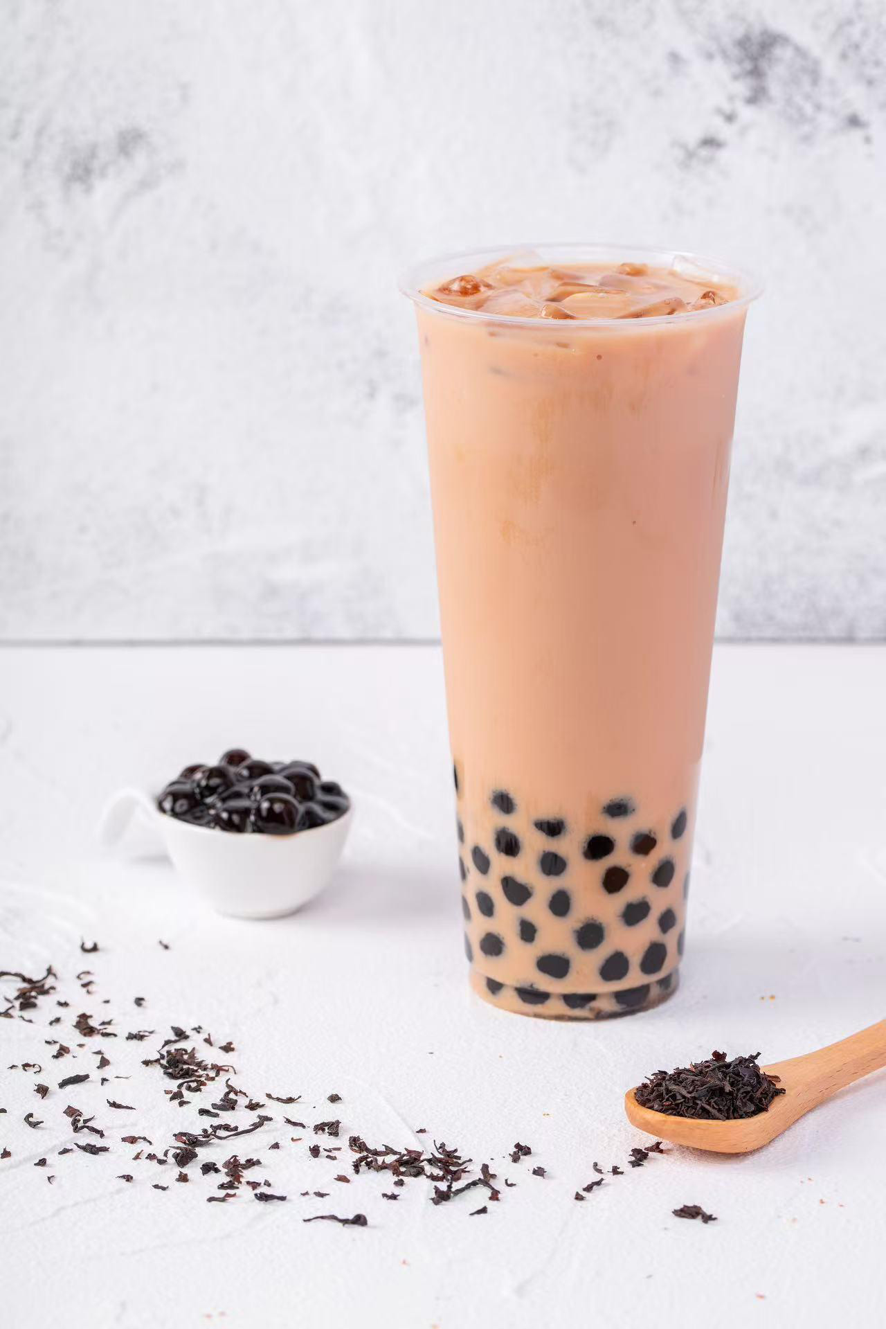Classic black milk tea with tapioca pearls, served with loose tea leaves at Pop Ice Cream, a Dessert Shop restaurant in Bonita Springs