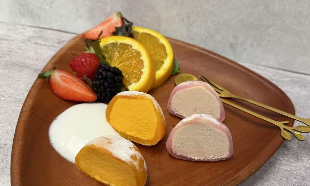 Mochi Ice Cream Sliced fruit and cream accompaniment at Pop Ice Cream, a Dessert Shop restaurant in Bonita Springs