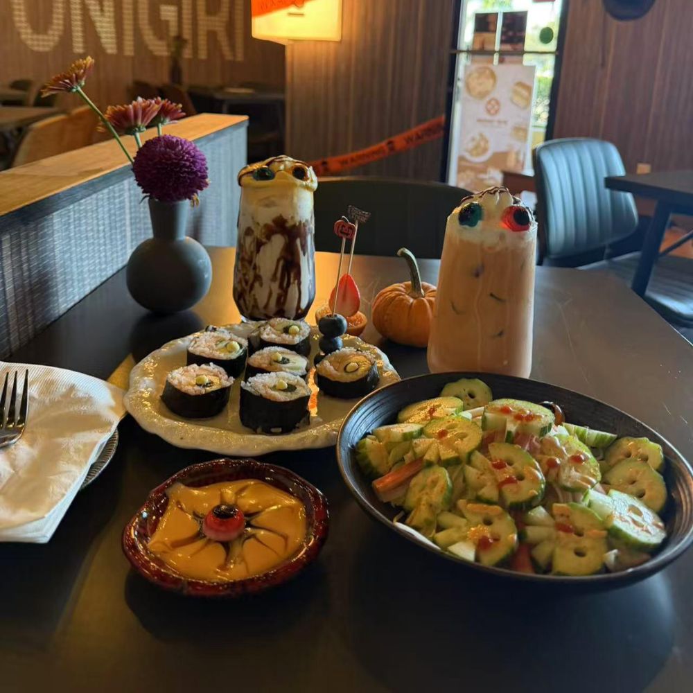 Halloween meal spread with sushi and drinks at Pop Onigiri, a Japanese Restaurant in Bonita Springs
