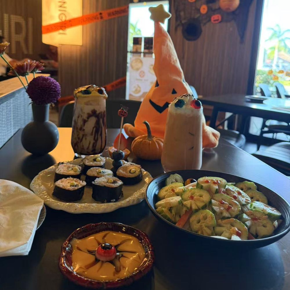 Halloween meal spread with sushi and drinks at Pop Onigiri, a Japanese Restaurant in Bonita Springs