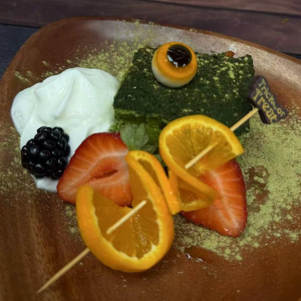 Matcha cake with fruits at Pop Onigiri, a Japanese Restaurant in Bonita Springs
