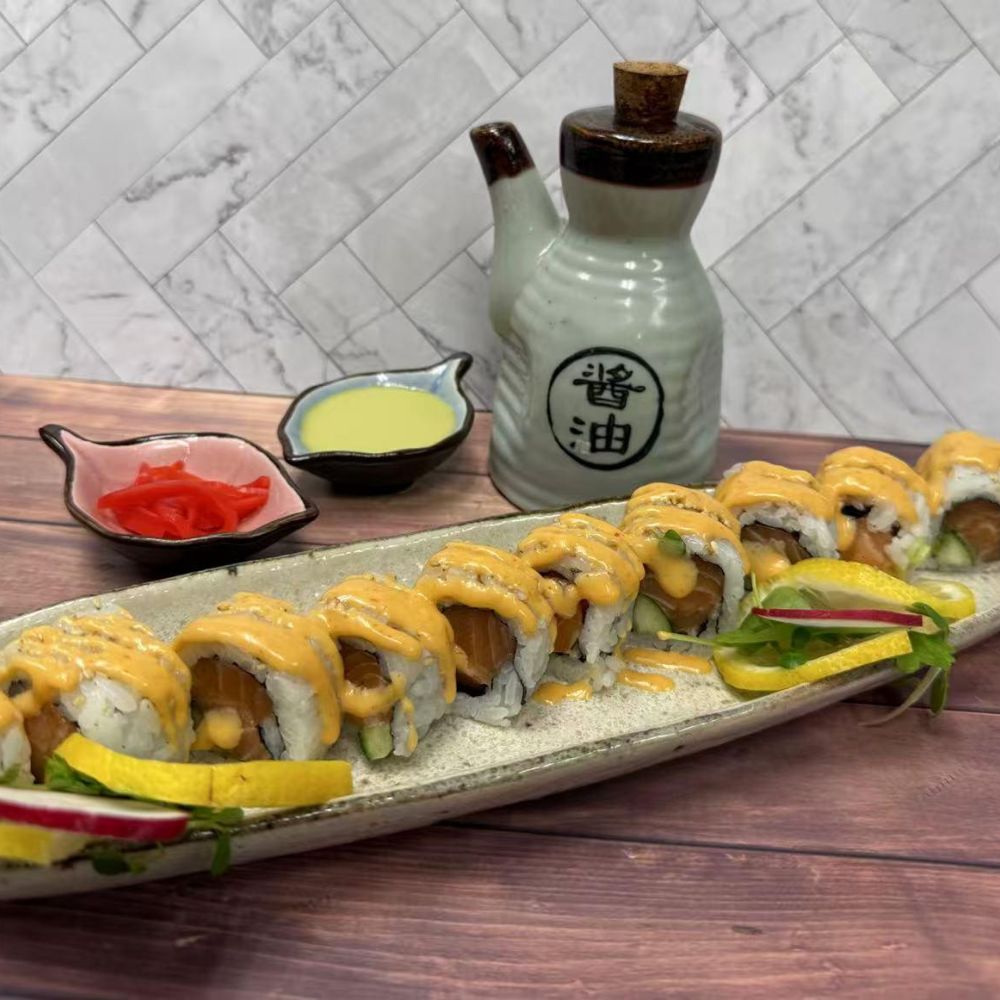 Salmon sushi rolls with sesame seeds at Pop Onigiri, a Japanese Restaurant in Bonita Springs