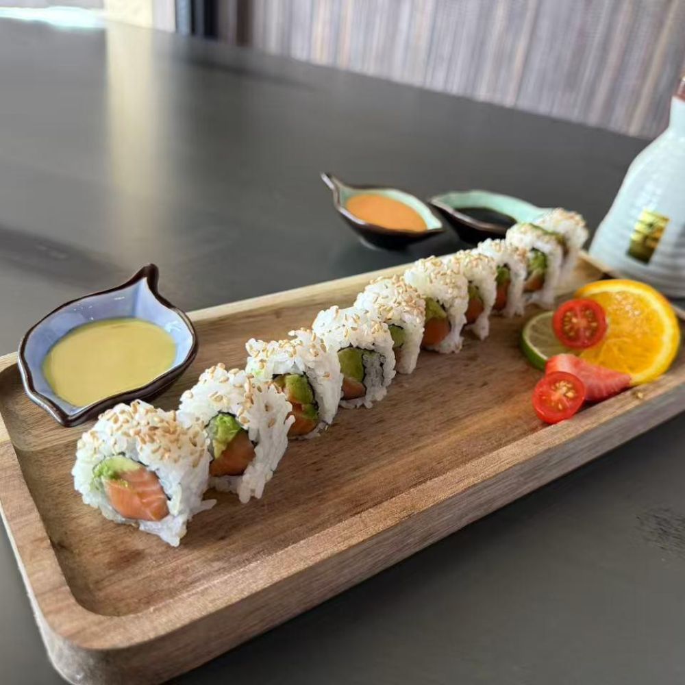 Sushi rolls platter with sauce at Pop Onigiri, a Japanese Restaurant in Bonita Springs
