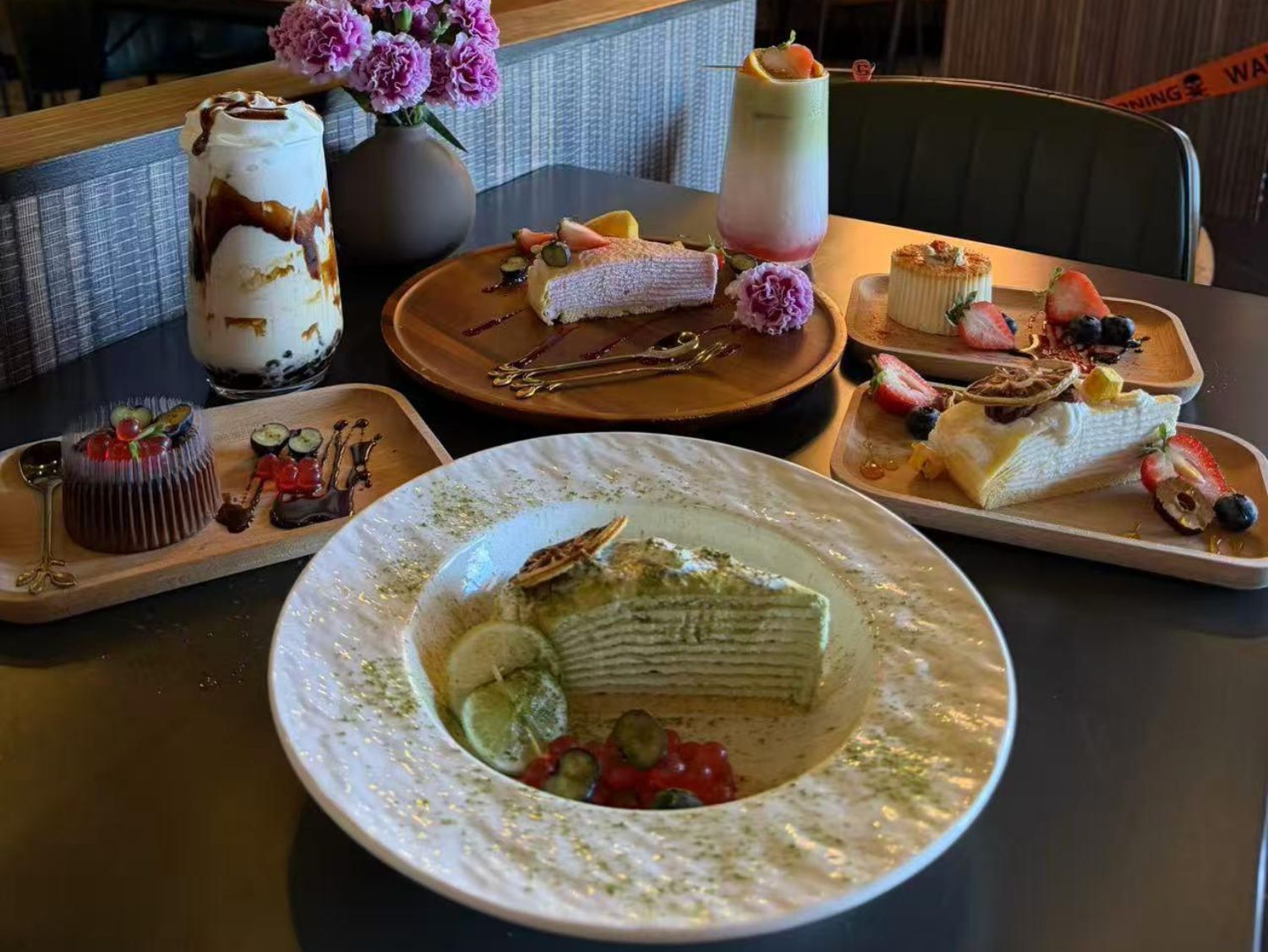 A variety of mille crepe cakes, desserts, and specialty drinks served at Pop-Onigiri (SushiTeaRamen) Japanese Restaurant in Bonita Springs.
