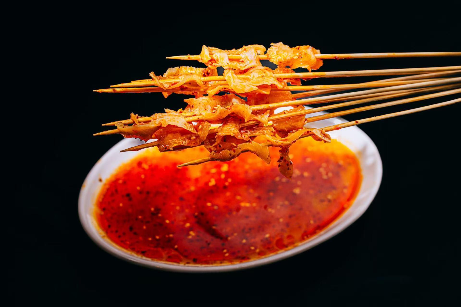 Skewered Tripe - Tripe on skewers with spicy dipping sauce at Potato Powder Love Noodle, a Chinese Restaurant in San Diego