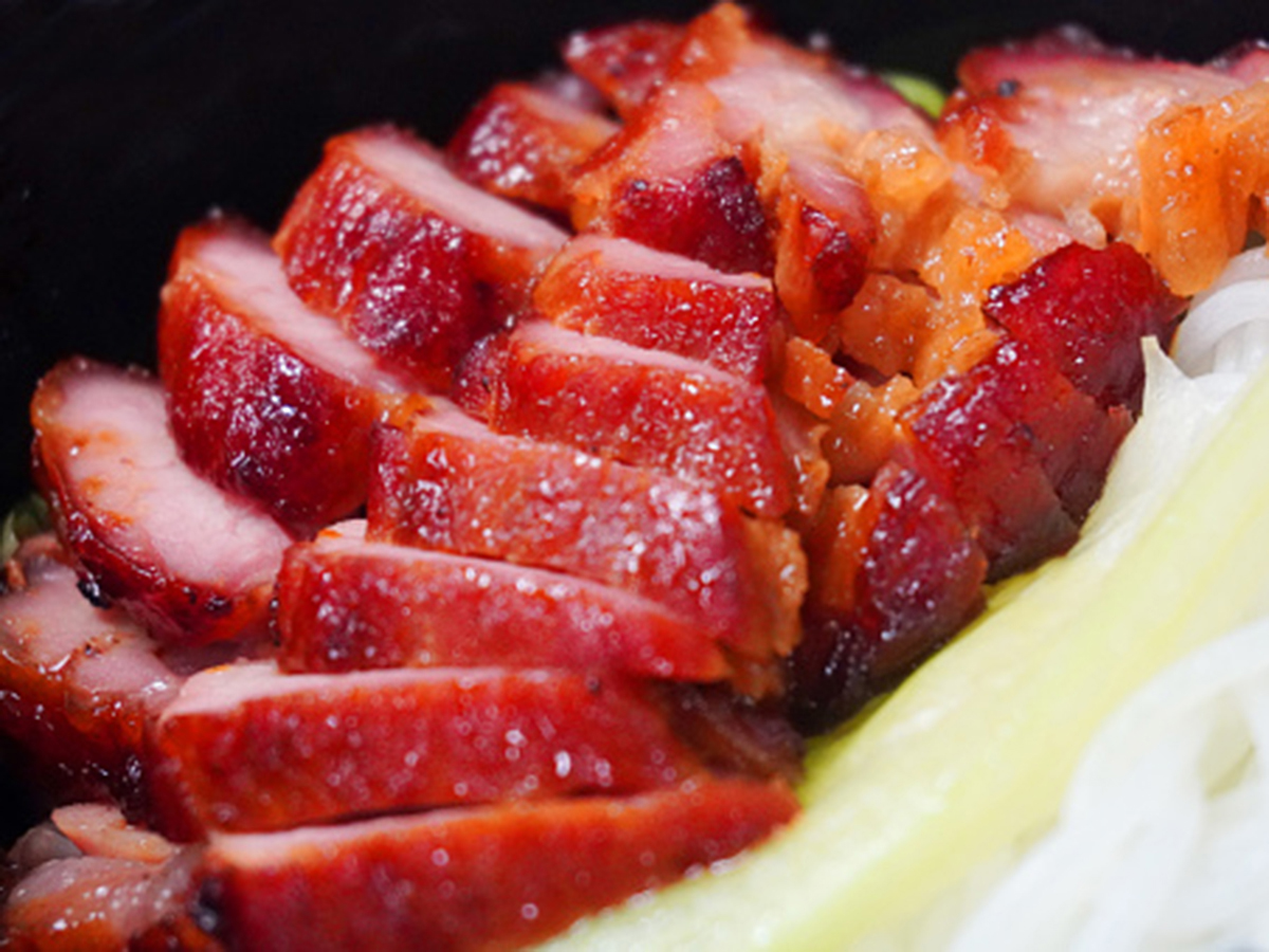 Glossy barbecued pork belly with cabbage at Precious, a Chinese Restaurant in Austin