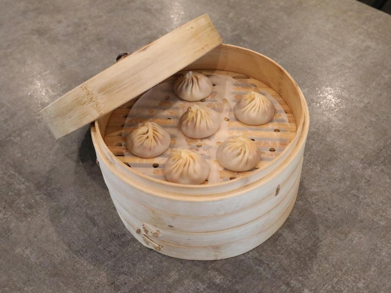 Juicy pork soup dumplings in bamboo steamer at Prince Dumpling, a Chinese Restaurant in Rosemead