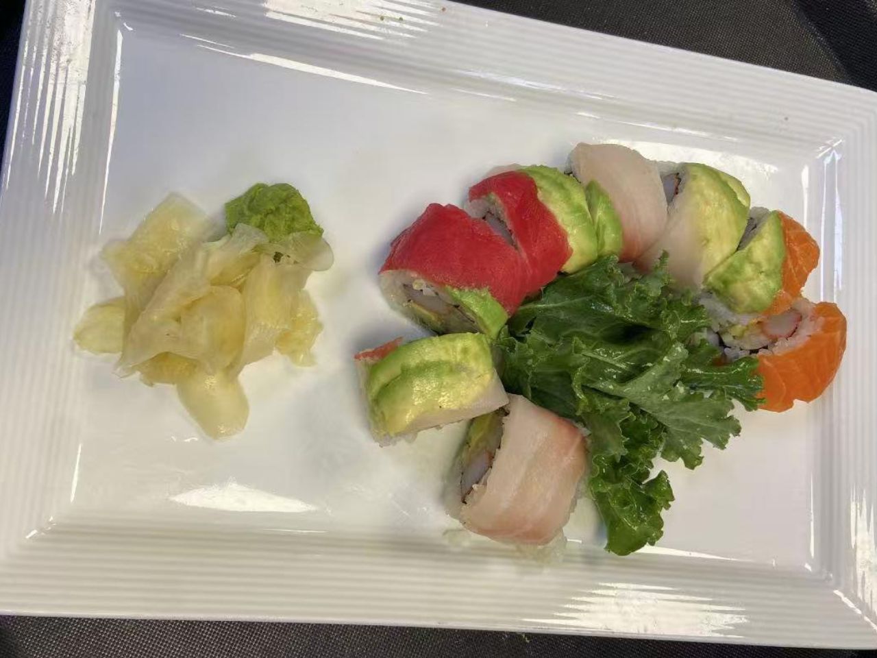 Rainbow sushi roll with fish and avocado at Py Kitchen, a Asian Fusion Restaurant in Browns Mills