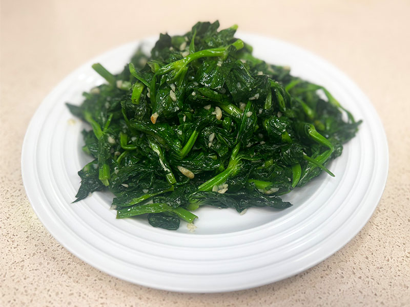 Fresh spinach stir-fried with aromatic garlic at Q's Noodle House, a Chinese Restaurant in Las Vegas