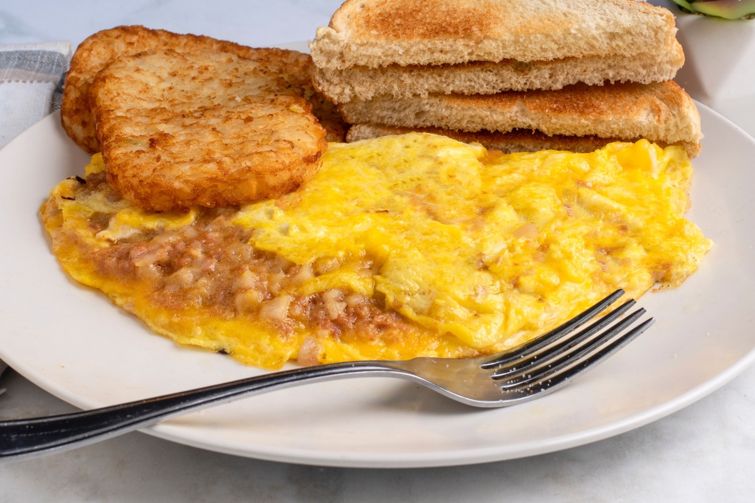 Cheese Omelette with Hash Browns and Toast at Rachel's Cafe, Brunch Restaurant in South Kingstown