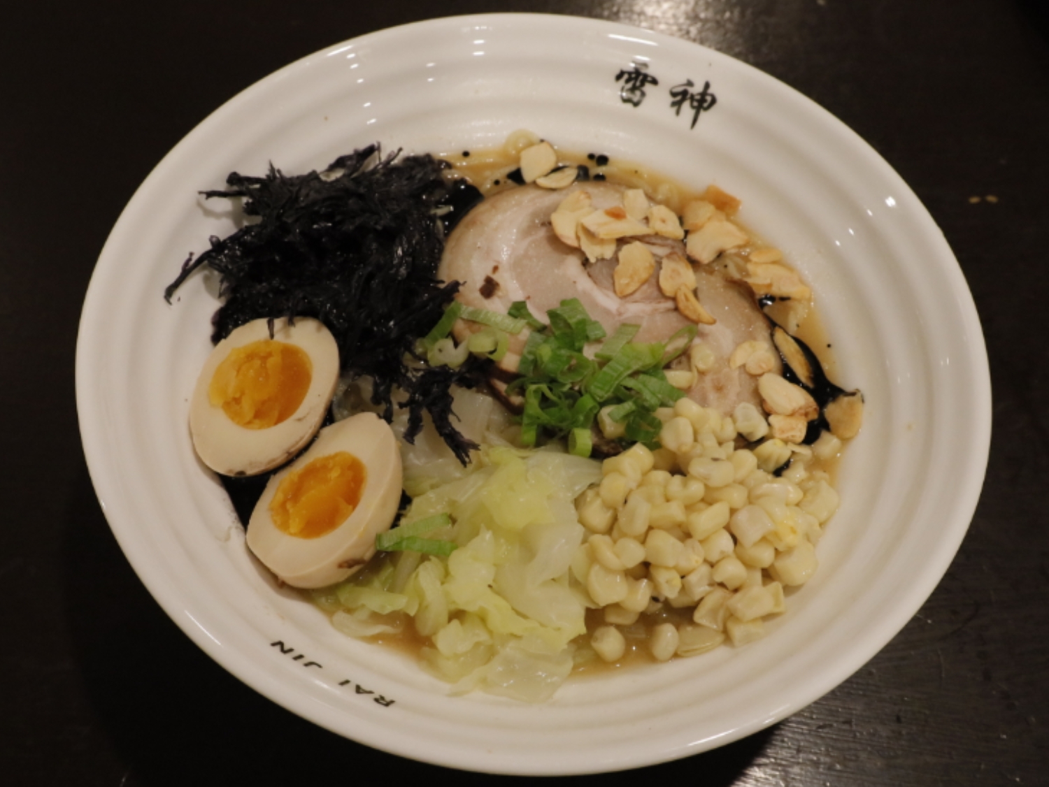 Shoyu ramen, eggs, seaweed. a Ramen Restaurant in Lincoln.