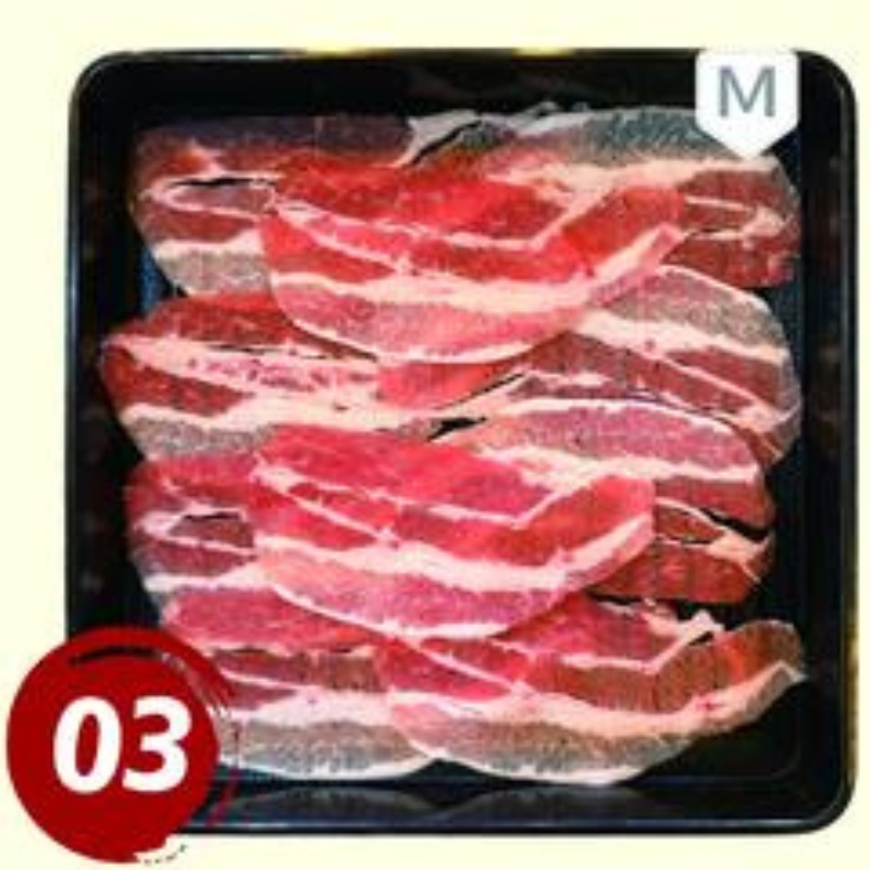 A tray of beef belly slices for hot pot at Rakkyo Hot Pot, a Chinese Restaurant in Colorado Springs