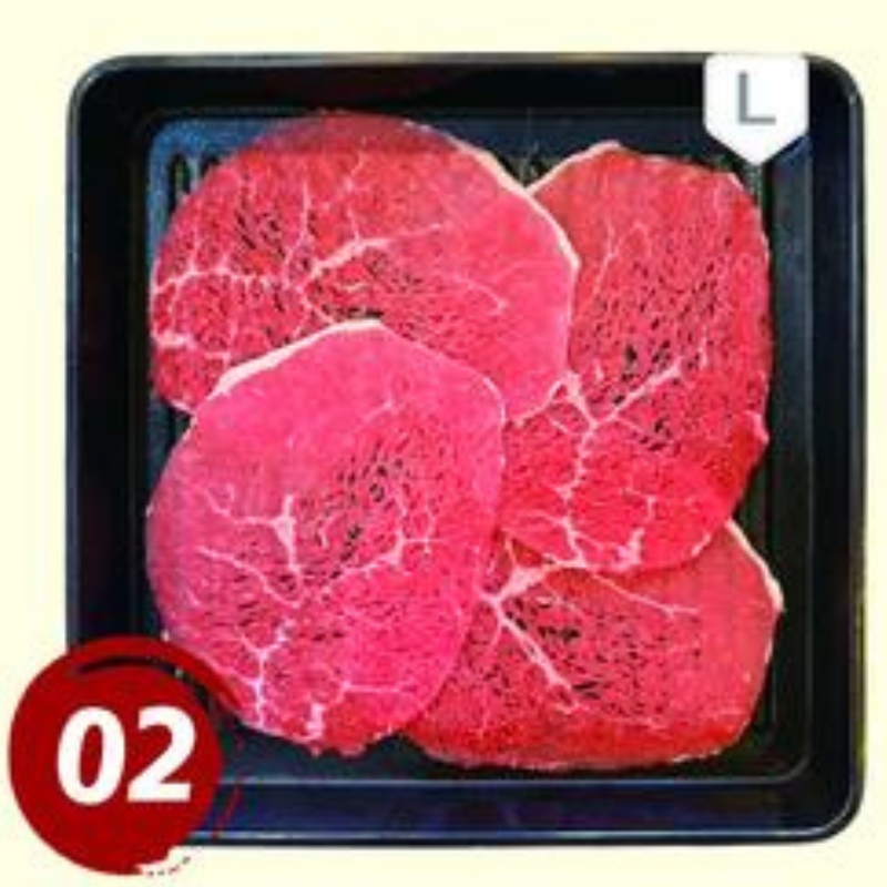 A tray of lean beef slices for hot pot at Rakkyo Hot Pot, a Chinese Restaurant in Colorado Springs