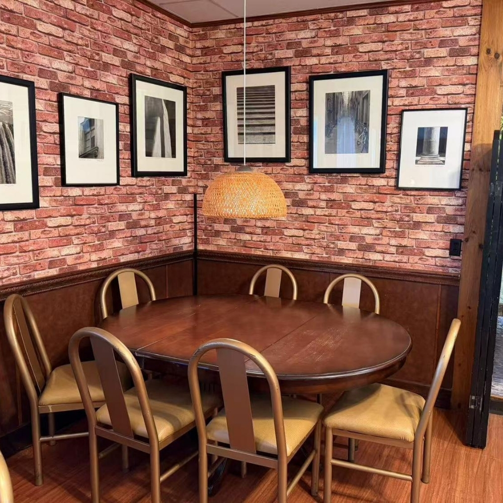 Round dining table with chairs at Raku Sushi, a Japanese Restaurant in Easton