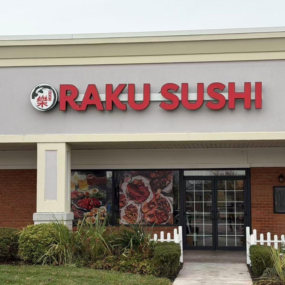 Raku Sushi exterior sign with food displays at Raku Sushi, a Japanese Restaurant in Easton