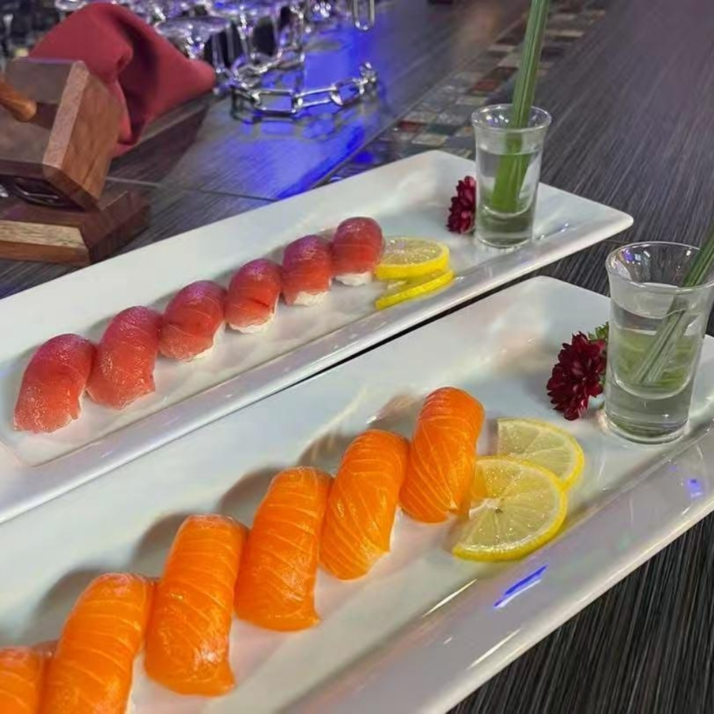 Tuna and salmon nigiri with lemon at Raku Sushi, a Japanese Restaurant in Easton