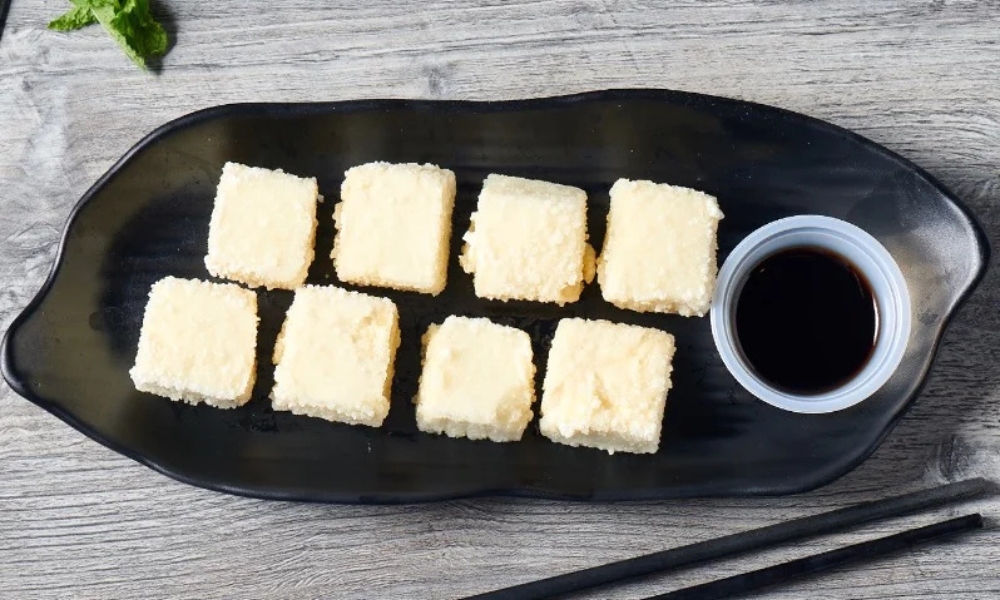 Crispy fried tofu with dark dipping sauce at RAMEN OSAKA, a Ramen Restaurant in San Jose