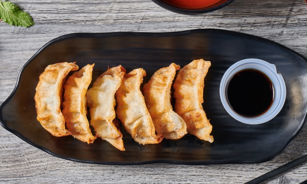 Crispy gyoza with dipping sauce at RAMEN OSAKA, a Ramen Restaurant in San Jose
