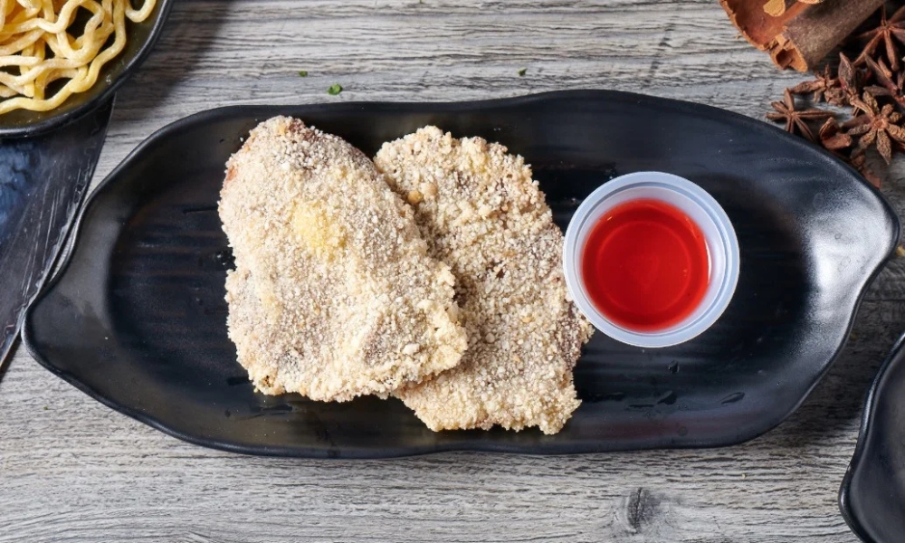 Crispy katsu chasu with red dipping sauce at RAMEN OSAKA, a Ramen Restaurant in San Jose