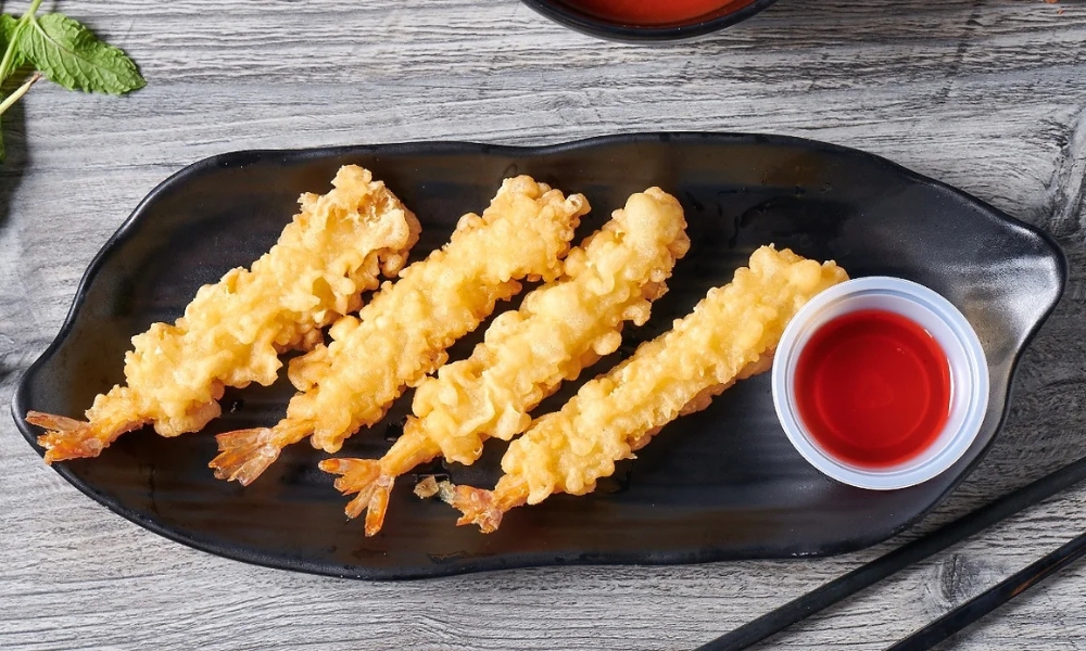 Crispy shrimp tempura with red dipping sauce at RAMEN OSAKA, a Ramen Restaurant in San Jose
