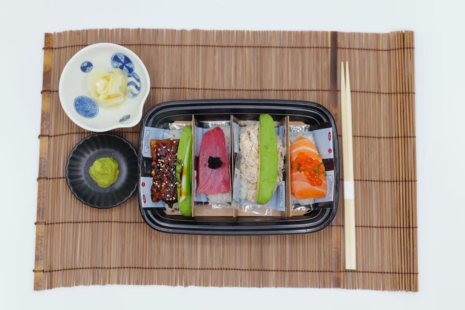 Assorted sushi pieces with various toppings and condiments at Raw N Dash, a Japanese Restaurant in Diamond Bar