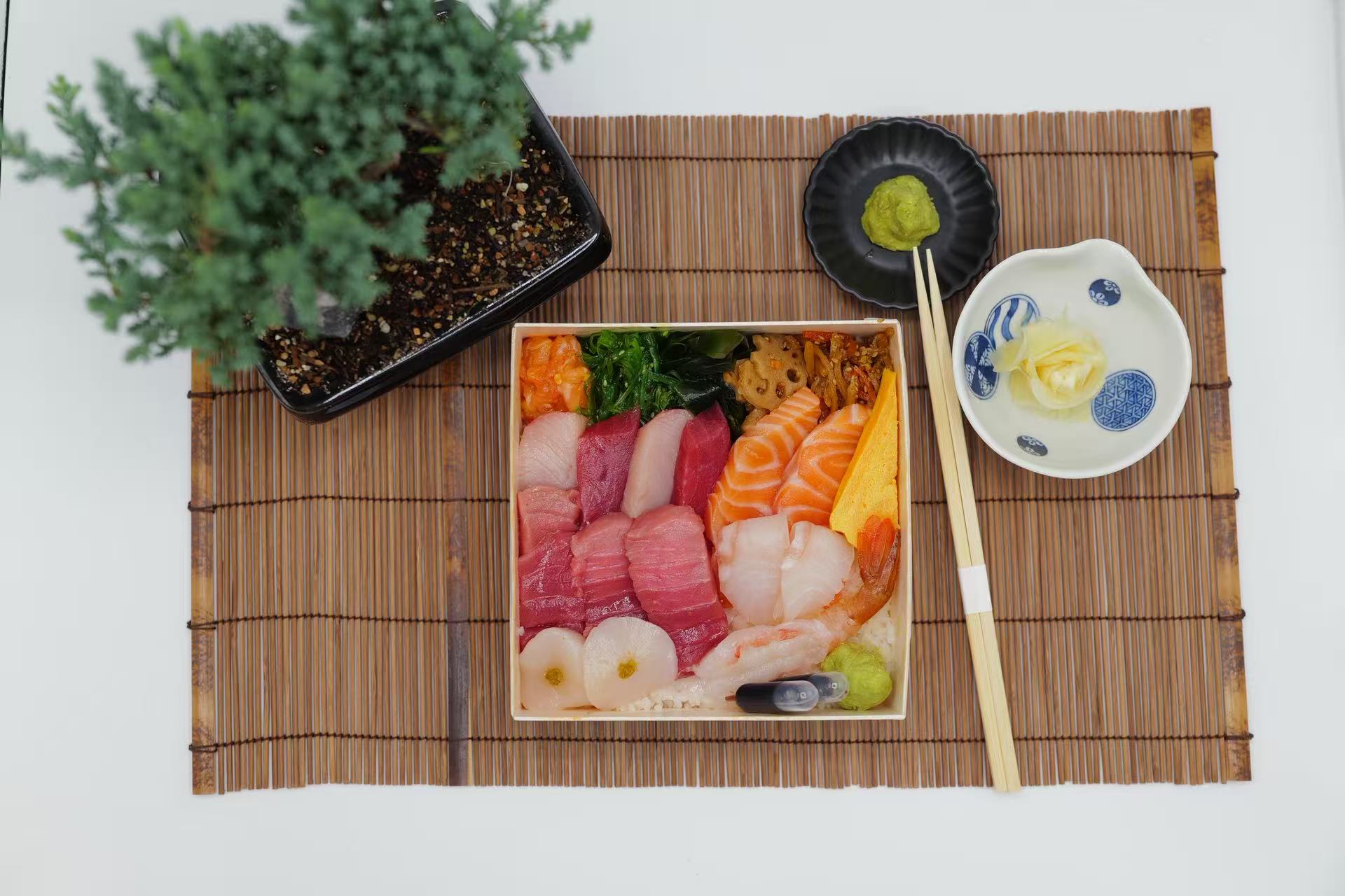 Assorted fresh sashimi with side dishes and condiments at Raw N Dash, a Japanese Restaurant in Diamond Bar