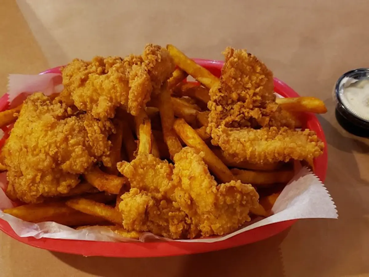 Fried chicken strips with fries at Red Crab, an Seafood Restaurant in Port St. Lucie.