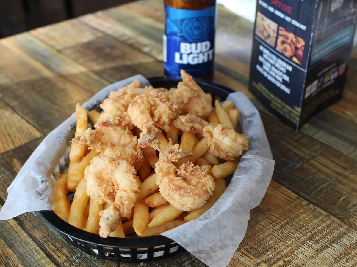 Fried shrimp served with fries at Red Crab, an Seafood Restaurant in Port St. Lucie.