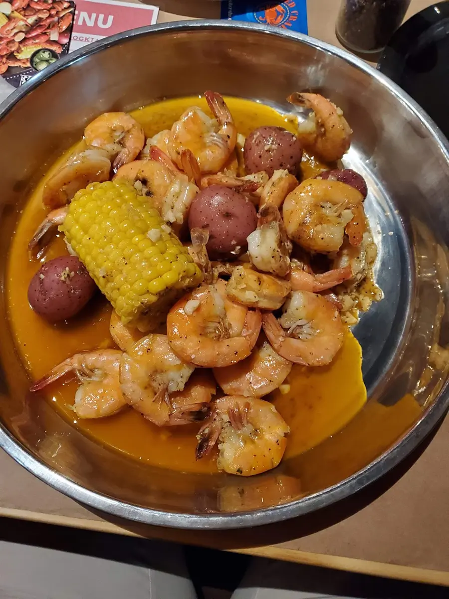 Shrimp boil with corn and potatoes at Red Crab, an Seafood Restaurant in Port St. Lucie.
