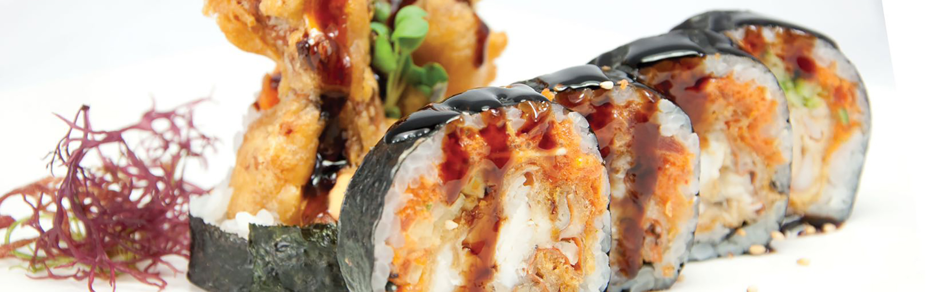 Crispy tempura shrimp sushi roll with dark soy glaze at Red Door Grill Asian Bistro Restaurant in Wainscott