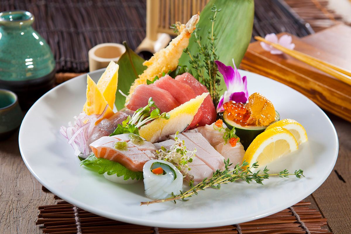 Premium sashimi platter with tuna, salmon and garnishes at Red Ginger Asian Bistro, an Asian Fusion Restaurant in Lake City