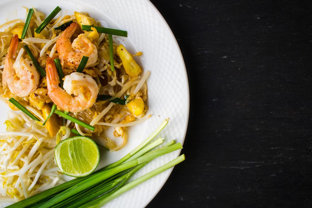 Shrimp Pad Thai noodles with bean sprouts and lime at Red Ginger Asian Bistro, an Asian Fusion Restaurant in Lake City